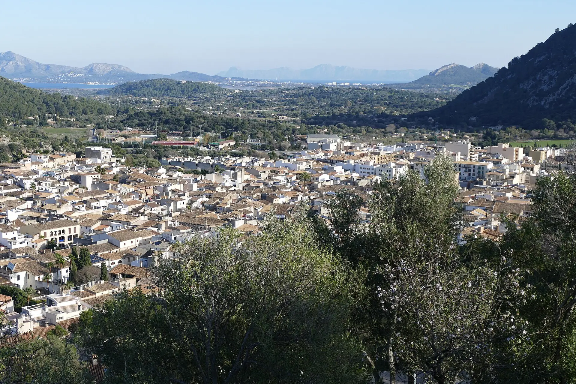 View from Calvari over the rooftops of Pollensa to the bay in the north