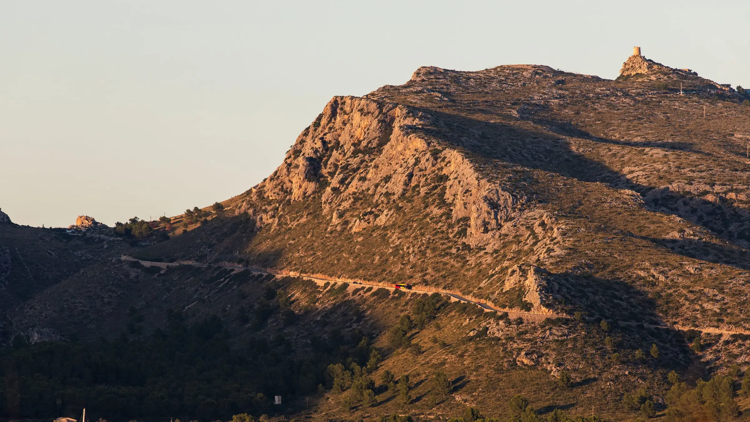 The bay of Port de Pollença in evening light, the foothills of the Serra de Tramuntana behind