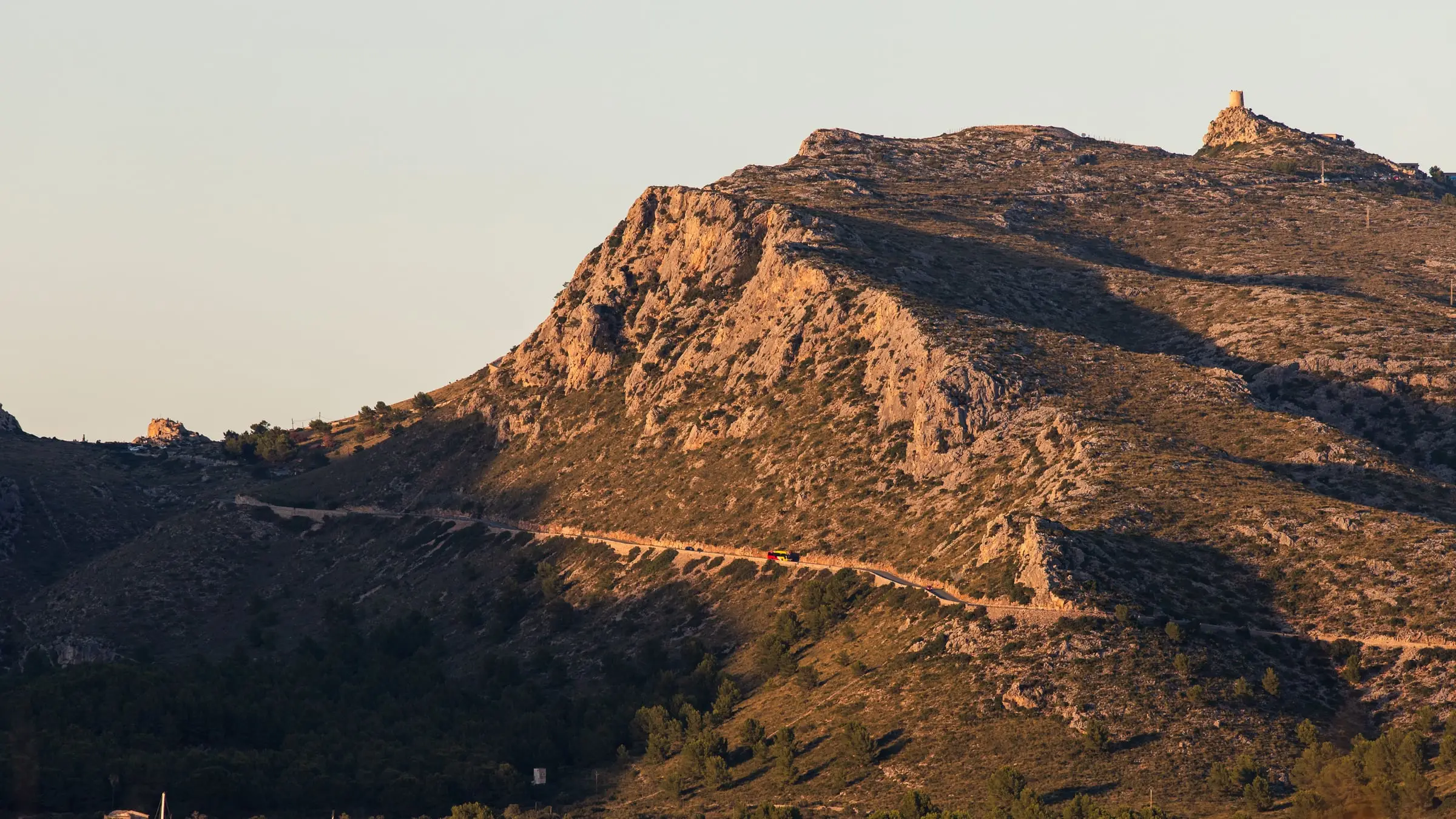 The bay of Port de Pollença in evening light, the foothills of the Serra de Tramuntana behind